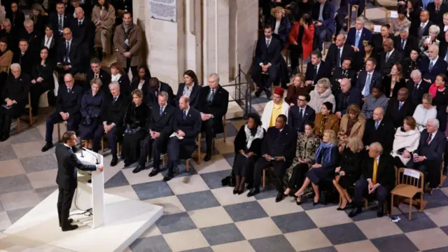 French President Macron addresses dignitaries at Notre-Dame