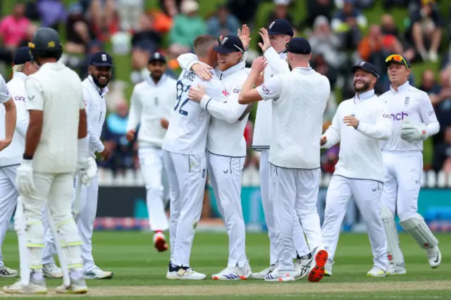 England celebrate a wicket