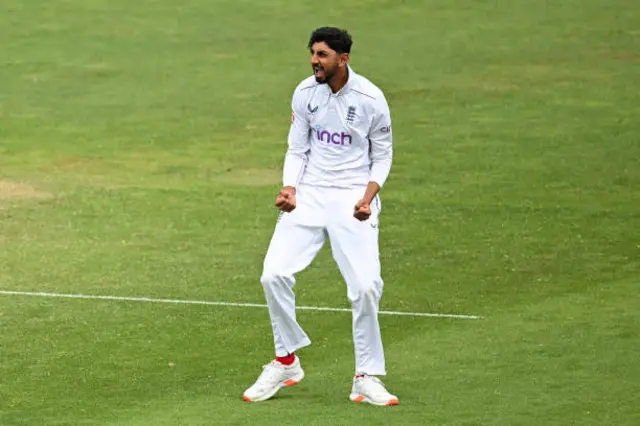 Shoaib Bashir celebrates after dismissing Glenn Phillips