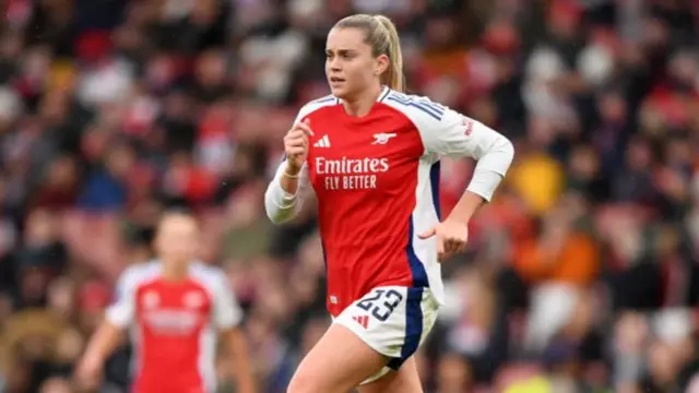 Alessia Russo of Arsenal looks on