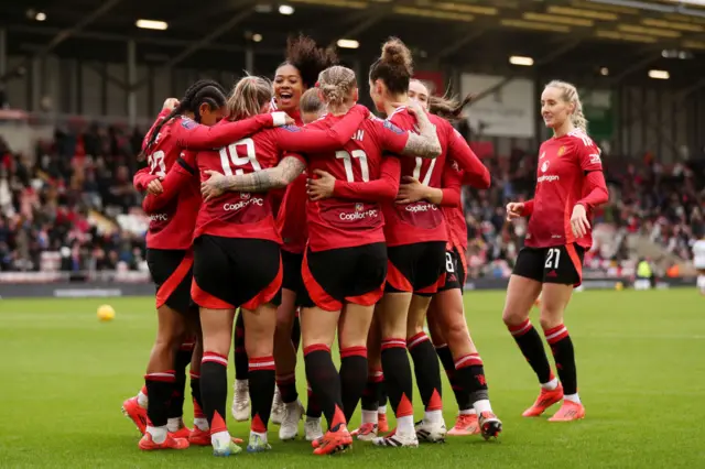 Elisabeth Terland of Manchester United celebrates scoring a goal