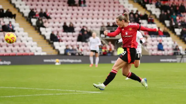 Elisabeth Terland of Manchester United shoots at goal