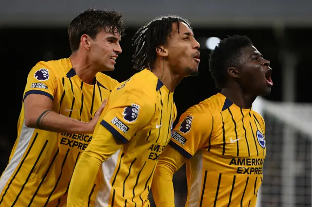 Carlos Baleba of Brighton & Hove Albion celebrates his goal with team mates Matt O'Riley and Joao Pedro.