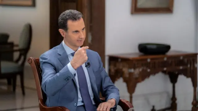 Syria's President Bashar al-Assad speaks during an interview with Sky News Arabia in Damascus