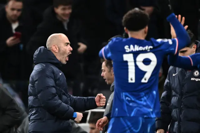 Chelsea manager Enzo Maresca celebrates after the match.