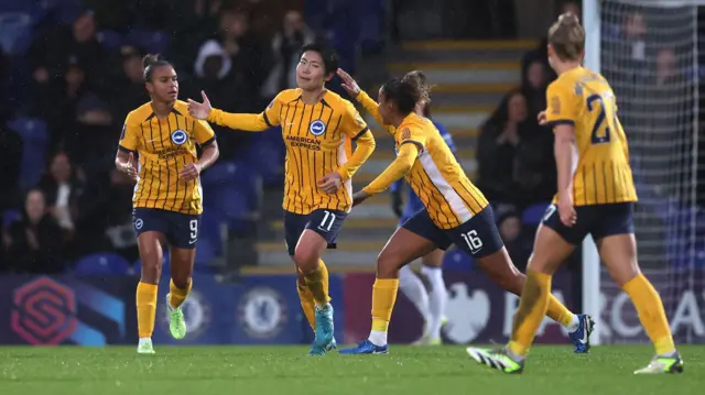 Brighton and Hove Albion's Kiko Seike celebrates scoring their side's second goal