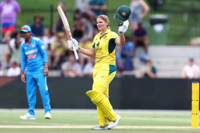 Georgia Voll celebrates a century v India