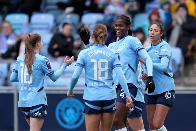 Manchester City's Khadija Shaw celebrates with her team-mates after scoring