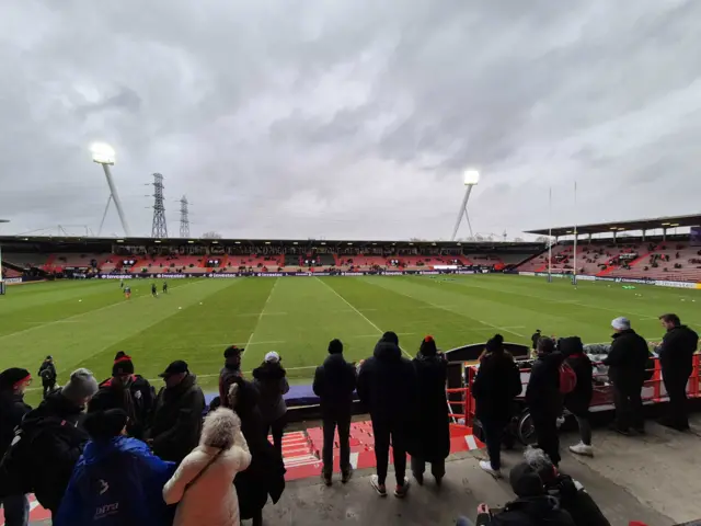 Fans watch on as the players warm-up