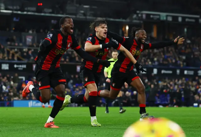 AFC Bournemouth's Dango Ouattara celebrates scoring their second goal with AFC Bournemouth's Milos Kerkez and AFC Bournemouth's Antoine Semenyo