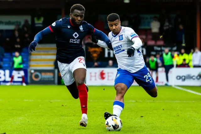 Ross County's Michee Efete and Rangers Hamza Igamane