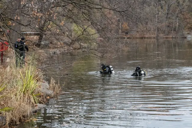 The New York City police department conducts an aquatic search for evidence near Bethesda Fountain in Central Park on December 9, 2024 in New York City