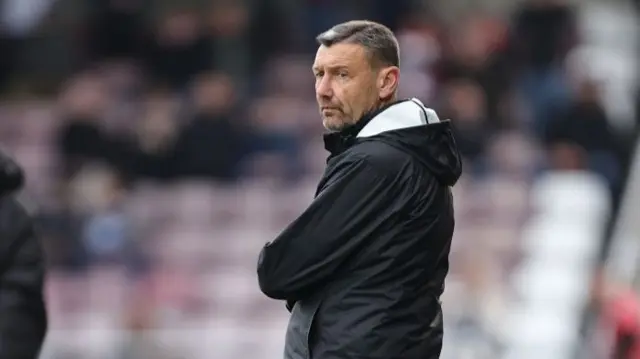 Then assistant manager and current caretaker Northampton Town boss Ian Sampson watching the Cobblers