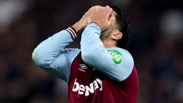 Carlos Soler of West Ham United reacts after a missed chance