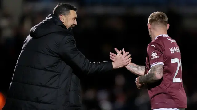 Victorious Northampton caretaker manager Ian Sampson with Martyn Waghorn at the final whistle