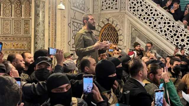 Jawlani speaking to supporters inside Ummayad Mosque, after the fall of Damascus