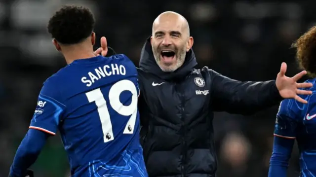 Enzo Maresca celebrates with Jadon Sancho