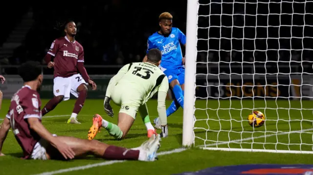 Malik Mothersille taps home the equaliser for Peterborough