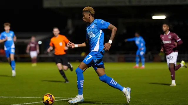 Peterborough's Malik Mothersille goes on the attack