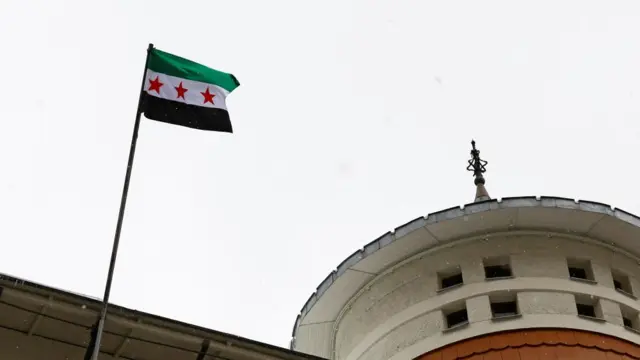 A view shows the Syrian rebel flag installed on the building of the embassy of Syria in Moscow.