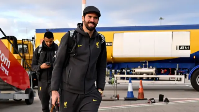 Alisson Becker with the Liverpool squad for their Champions League tie against Girona