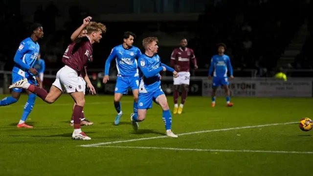 Cameron McGeehan scores Northampton's second goal of the night against Peterborough