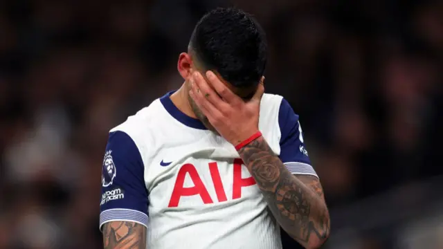 Tottenham defender Cristian Romero suffers an injury against Chelsea