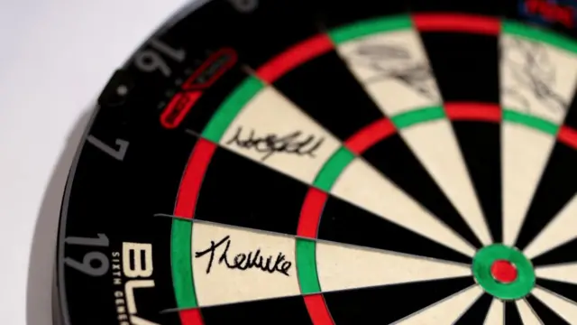 Dart board signed by Premier League competitors