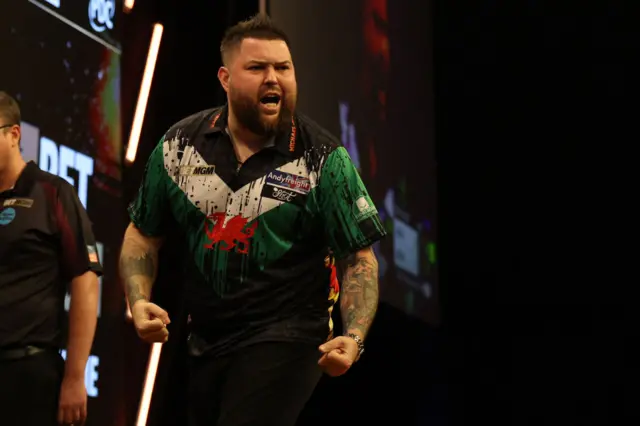 Michael Smith celebrates