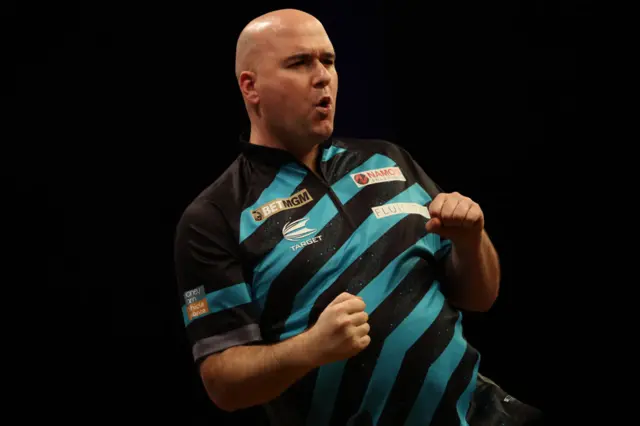 Rob Cross celebrates