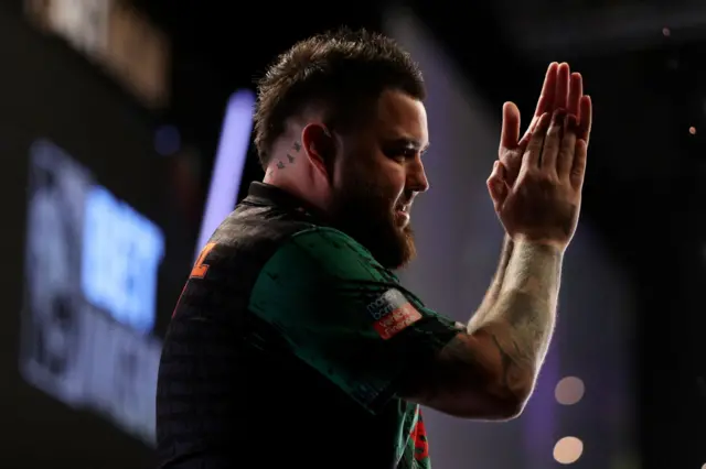 Michael Smith celebrates