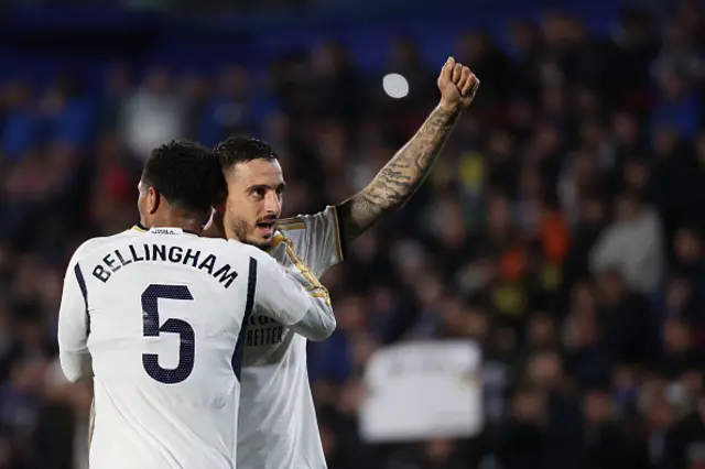 Joselu celebrates with Jude Bellingham