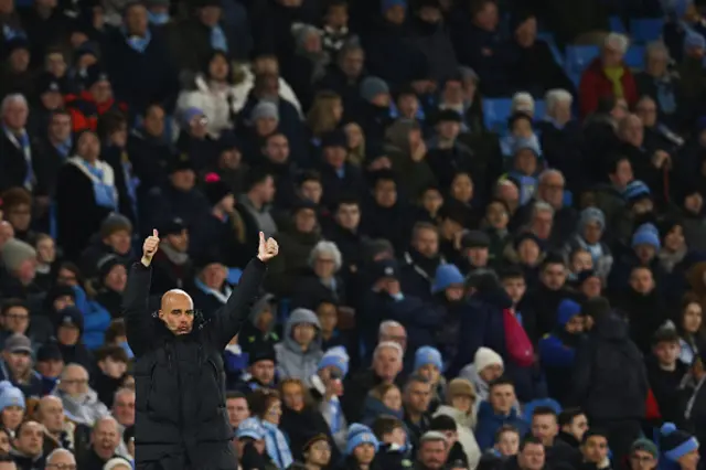 Pep Guardiola puts his thumbs up