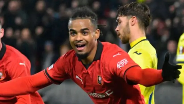 Lorenz Assignon celebrates scoring for Rennes