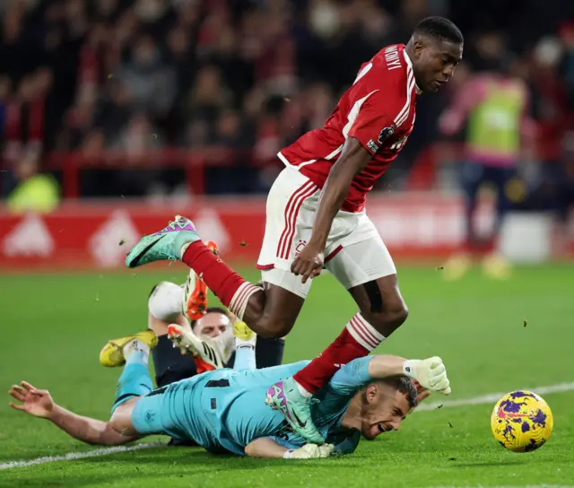 Awoniyi is fouled by Dubravka as he looks to go around him to get to goal.