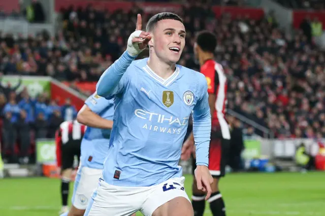 Phil Foden celebrates his third goal v Brentford.