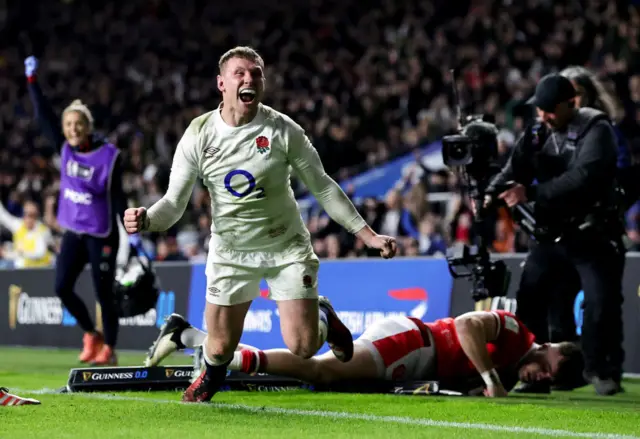 Fraser Dingwall celebrating scoring a try