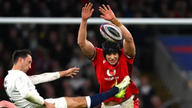 Dafydd Jenkins reaching for the ball