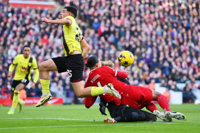 Virgil van Dijk falls over