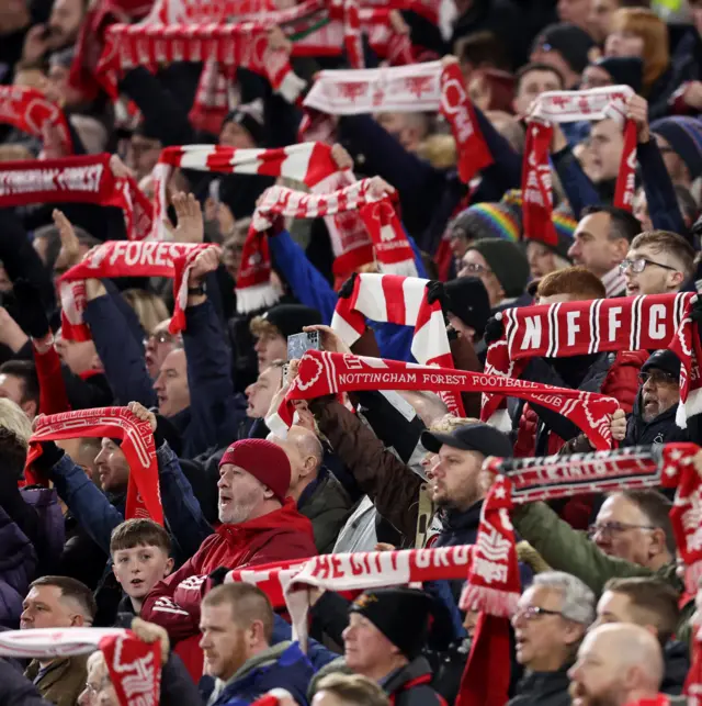 Forest fans sing the club anthem before kick off.