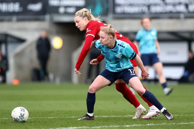 Lucy Fitzgerald of London City Lionesses and Sophie Roman Haug of Liverpool battle for the ball