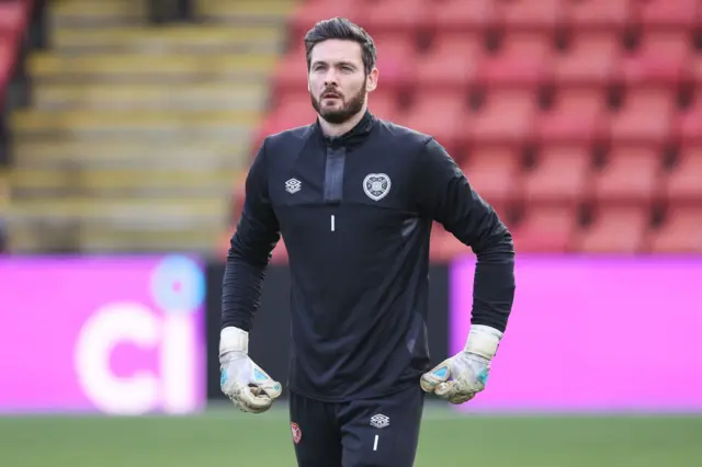 Craig Gordon warms up