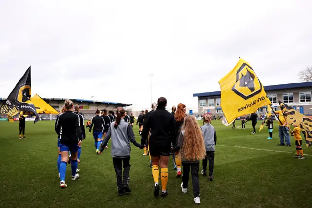 Both team's walk out ahead