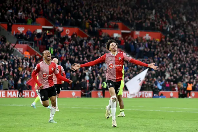 Samuel Edozie celebrates after scoring for Southampton in their comeback win against Huddersfield Town