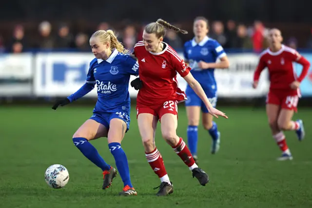 Kathrine Moeller Kuehl of Everton battles for possession with Charlotte Greengrass