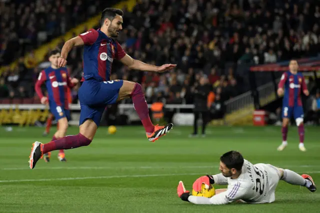 Ilkay Gundogan chases a ball