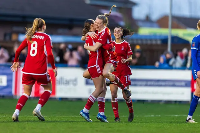 Charlotte Greengrass of Nottingham Forest celebrates with teammate Louanne Worsey