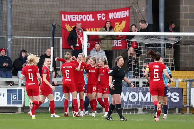 Sophie Roman Haug of Liverpool celebrates with teammates