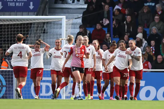 Rachel Williams celebrates with teammates