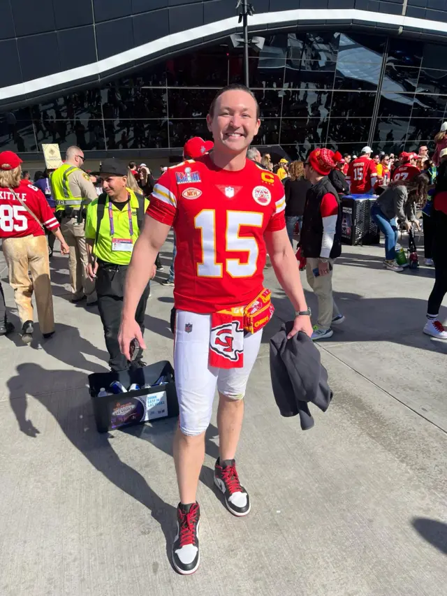 A fan wearing full Kansas City Chiefs kit